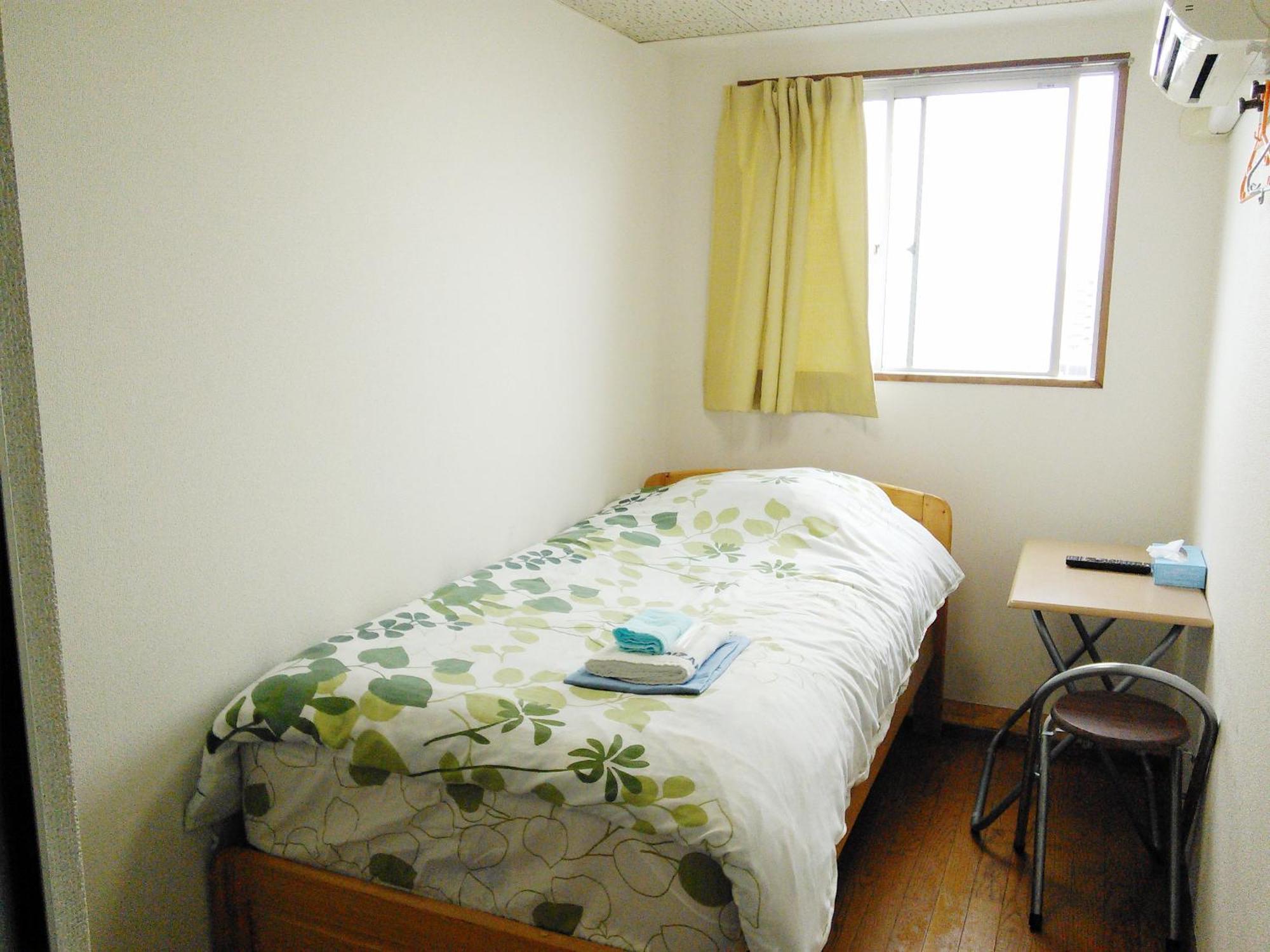 Hotel Raizan North Osaka Quarto foto
